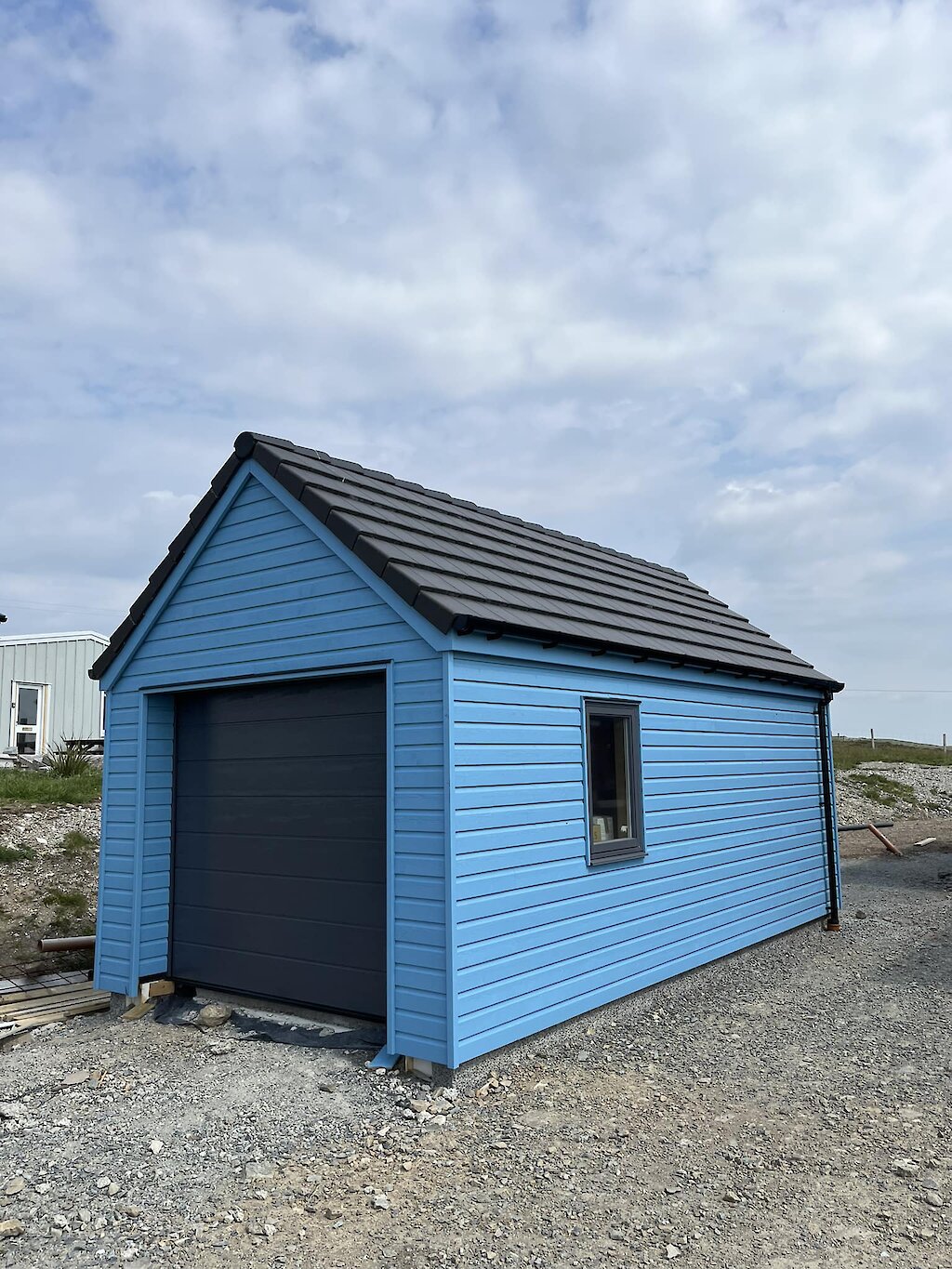 New timber clad single story garage